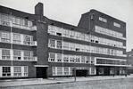 Hoek Hoofdweg-Postjesweg niet lang na de oplevering
              <br/>
              Uitgave "Plan West", ca 1925